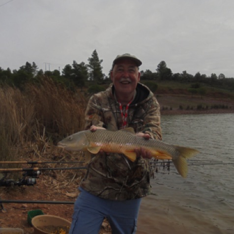 Paul Bowen with an Algarve barbel Paul Bowen with an Algarve barbel